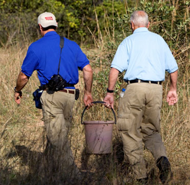It takes two men to carry water.